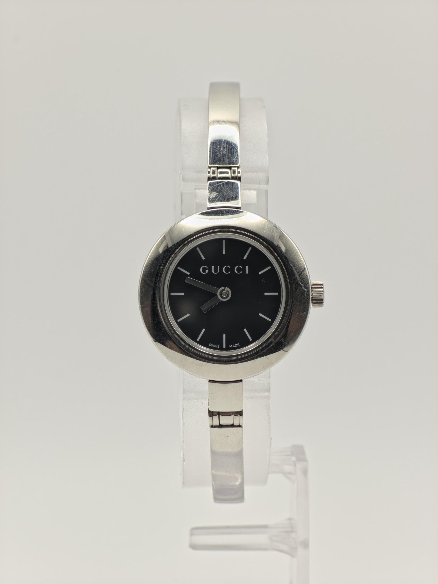 Gucci 105 Women’s Stainless Steel Quartz Watch – Black Dial – Swiss Made – Elegant Bangle Style