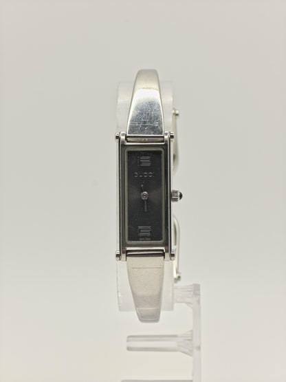 Gucci 1500L Ladies Swiss-Made Watch – Silver Bangle Bracelet – Black Rectangular Dial – Vintage Luxury