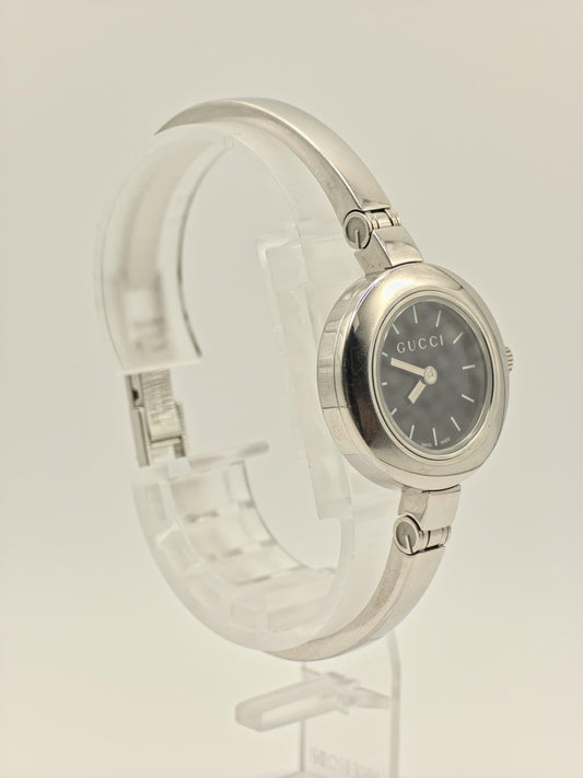Gucci 105 Women’s Stainless Steel Quartz Watch – Black Dial – Swiss Made – Elegant Bangle Style