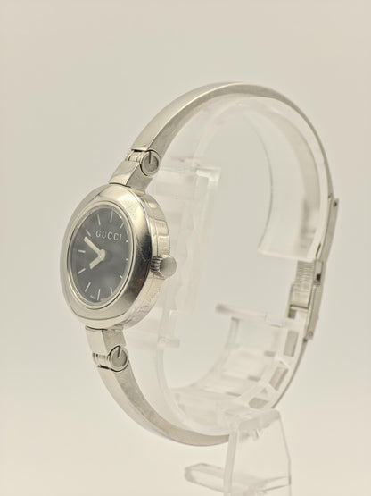 Gucci 105 Women’s Stainless Steel Quartz Watch – Black Dial – Swiss Made – Elegant Bangle Style