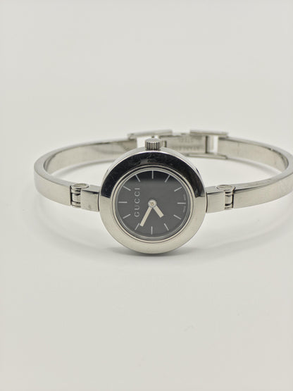 Gucci 105 Women’s Stainless Steel Quartz Watch – Black Dial – Swiss Made – Elegant Bangle Style