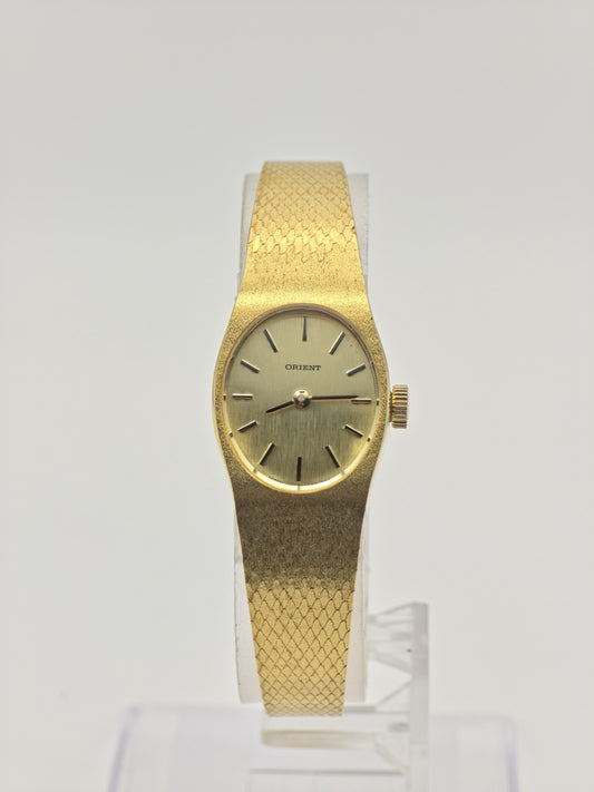Vintage Orient Women's Watch Gold Tone Bracelet Champagne Dial Quartz Japan - 365