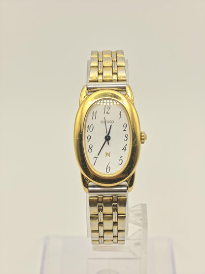 Vintage Seiko Women's Quartz Oval White Dial Two-Tone Dress Watch - 391