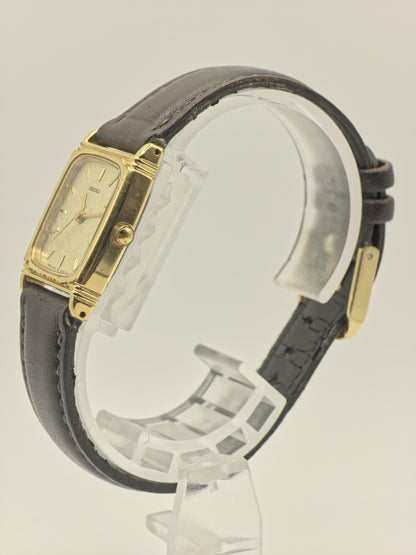 Vintage Seiko Women's Quartz Gold Tone Textured Dial Rectangular Dress Watch - 403