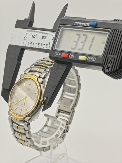 Vintage Citizen Exceed Euros WR 10 Bar Quartz Two-Tone Men's Dress Watch - 409