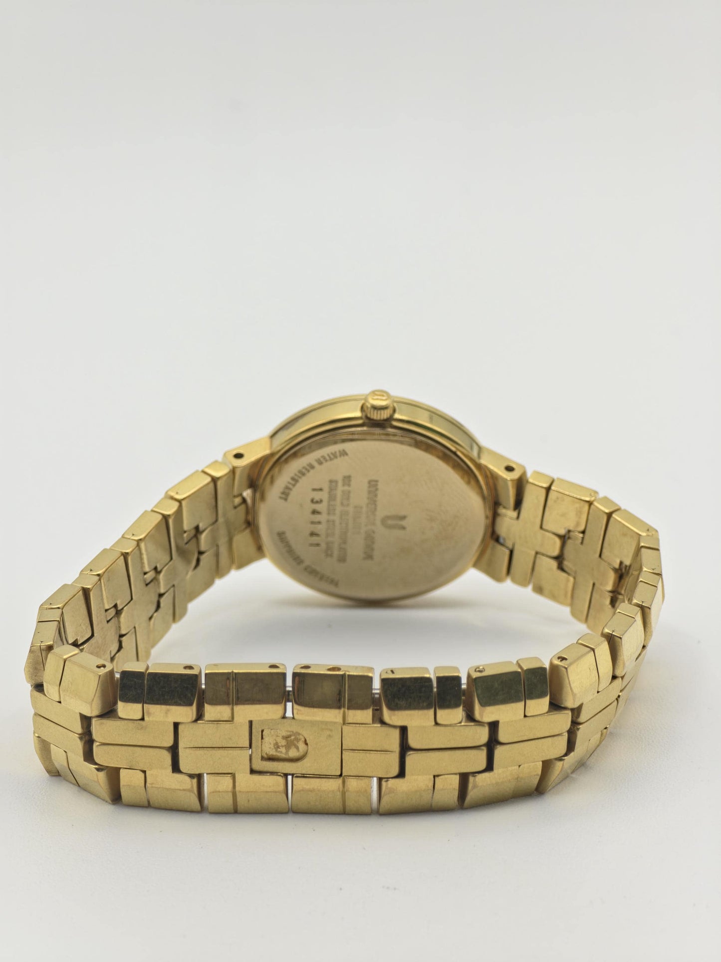 Vintage Universal Genève Women's Quartz White Dial Gold Tone Dress Watch Swiss Made - 433