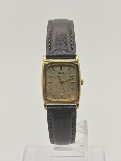 Vintage Seiko Women's Quartz Gold Tone Textured Dial Rectangular Dress Watch - 403